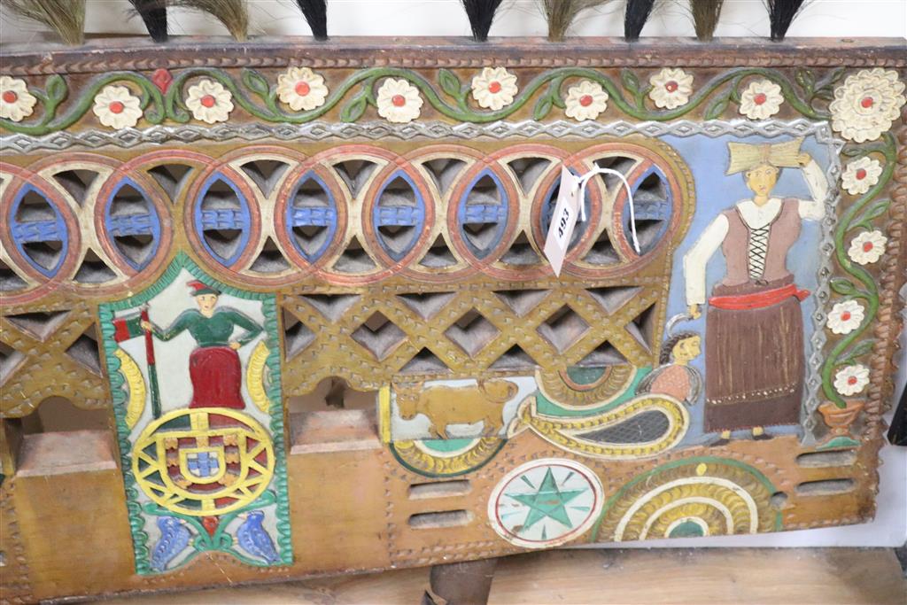 An Eastern European folk art carved and painted wood dog cart wedding gift, 72cm x 108cm